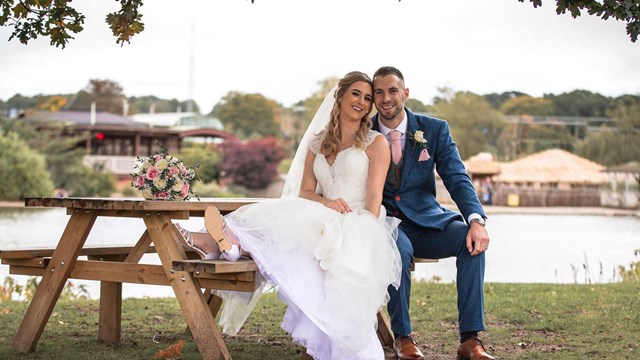 Image of wedding venue sat on bench swan lake web res